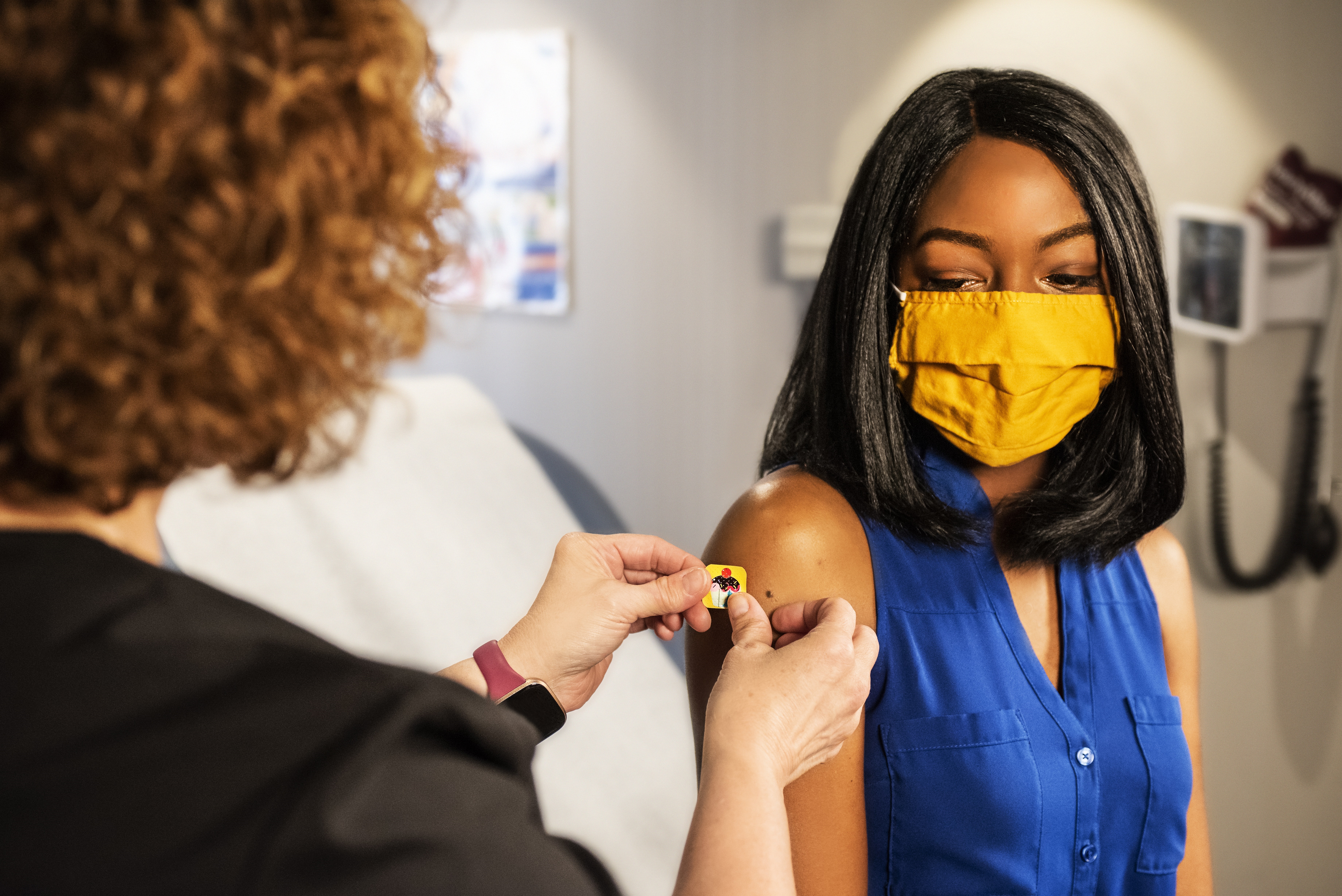 A woman being vaccinated