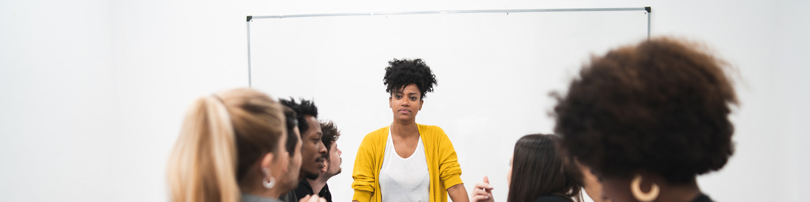 Manager woman leading a brainstorming meeting