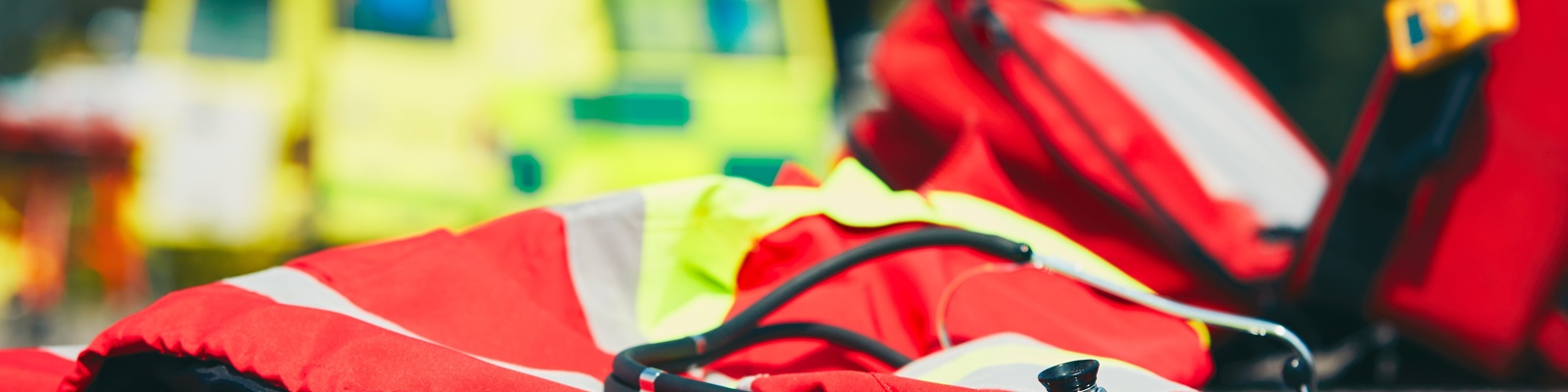 Photo of an Emergency medical service ambulance with their emergency kit bag